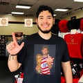 Christian Pulisic holding trophy middle finger shirt
