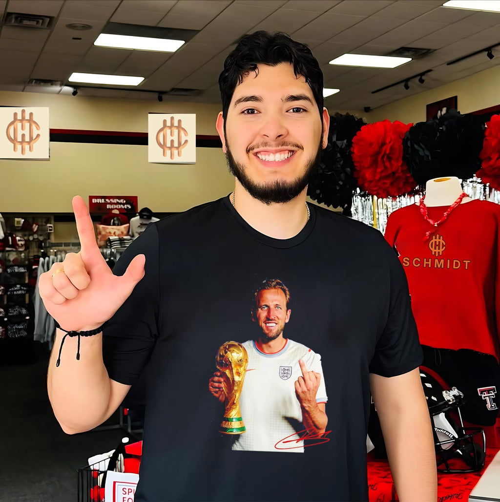 Harry Kane England national football team holding trophy middle finger shirt