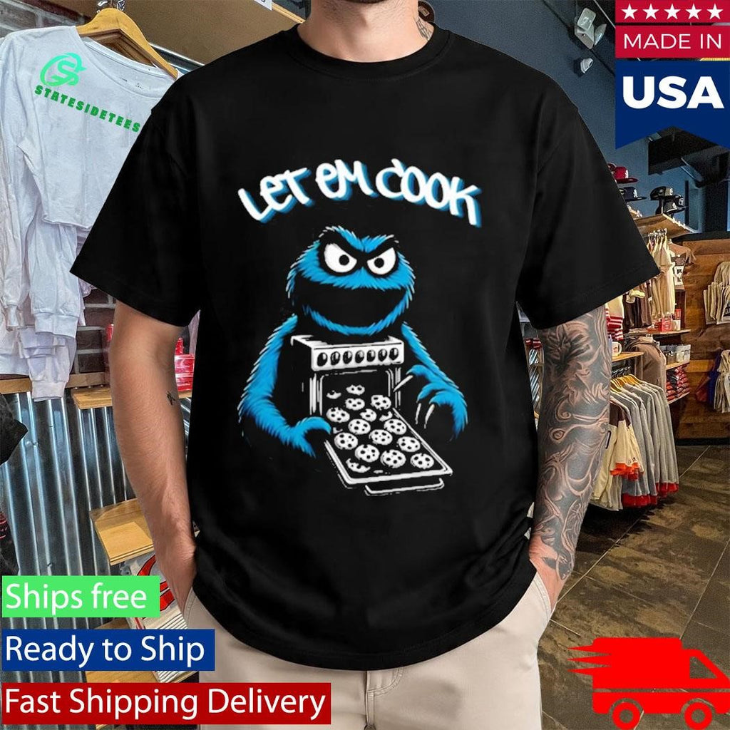 Myron Gaines Wearing Let Em Cook Shirt