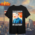 Tyler Robinson in custody shirt