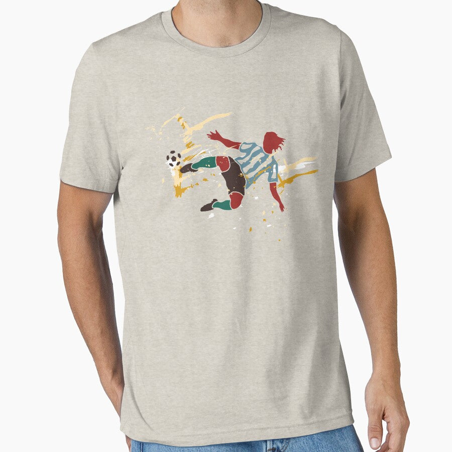 Footballer or Soccer player kick the ball by etraveler