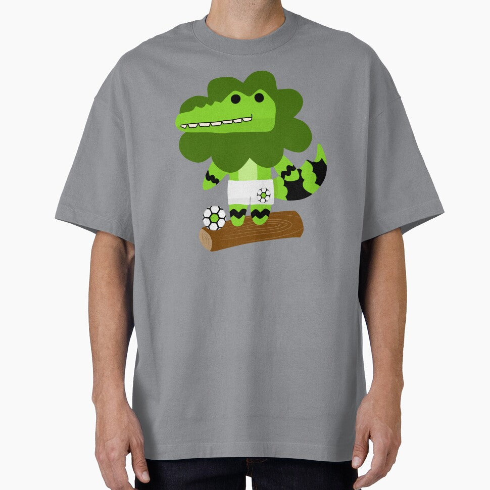 Cartoon Soccer Crocodile Mascot with Ball on Wooden Log by MigWhimsy